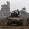 This picture, taken during a media tour organised by the Israeli military on January 8, 2024, shows troops operating in the central Gaza Strip, amid continuing battles between Israel and the Palestinian militant group Hamas