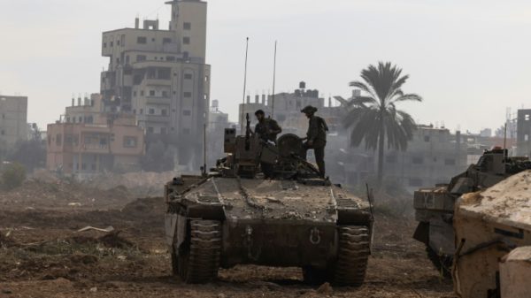 This picture, taken during a media tour organised by the Israeli military on January 8, 2024, shows troops operating in the central Gaza Strip, amid continuing battles between Israel and the Palestinian militant group Hamas