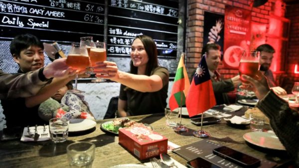 Lithuanians say they have been greeted with toasts, handshakes from strangers, and free taxi rides in Taiwan after their country stood up to China