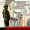 A soldier stands guard outside Carondelet Presidential Palace in Quito on January 9, 2024, a day after Ecuadoran President Daniel Noboa declared a state of emergency following the escape from prison of a dangerous narco boss
