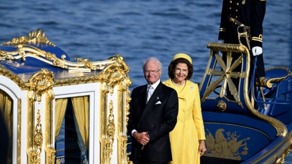 King Carl XVI Gustaf of Sweden and Queen Silvia enjoy the festivities to mark his 50 years on the throne