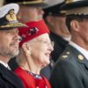 Queen Margrethe, seen flanked by her sons Crown Prince Frederik and Prince Joachim at an August parade, is now Europe's longest-serving monarch -- and only queen
