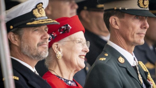 Queen Margrethe, seen flanked by her sons Crown Prince Frederik and Prince Joachim at an August parade, is now Europe's longest-serving monarch -- and only queen