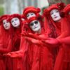 Members of performance troupe Red Rebel Brigade march in London at the Extinction Rebellion demonstration